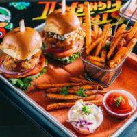 Buffalo Chicken Sliders · Fried chicken tossed in buffalo sauce topped with chunky blue cheese, jack cheese, creamy co...