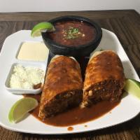 1 Burrito de Birria ·  Seasoned Shredded meat, Slightly spicy, served with their own broth.