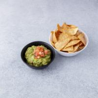 Guacamole with Chips · Served with corn chips, mashed avocado with onion, cilantro, tomatoes, lime.