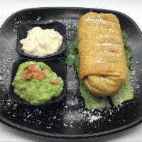 BURRITO CHIMICHANGA · flour tortilla deep fried stuffed with rice, beans, choice of meat, cheese topped with sour ...
