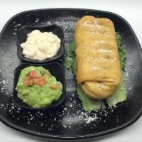SHRIMP CHIMICHANGA · flour tortilla deep fried stuffed with rice, beans, cheese topped with sour cream, cotija ch...