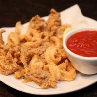 Fried Calamari · Delicately fried calamari, served with a side of our house made tomato sauce.