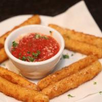 Fried Cheese · 8 breaded mozzarella sticks with a side of our homemade tomato sauce.