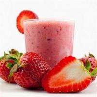 48. Fresa Fruit Shake en leche · Strawberry.