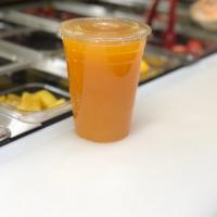 Jugó natural de naranja · It is made 100% natural juice