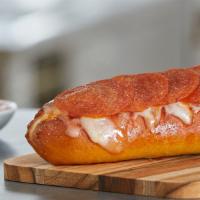 Pepperoni Melt · Spices, cheese, and pepperoni, oh my! All on top of a soft, fresh-baked pretzel, paired with...