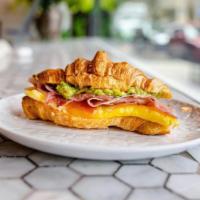 Egg and Cheese Croissant · 2 eggs and cheddar cheese ( add-ons are optional )