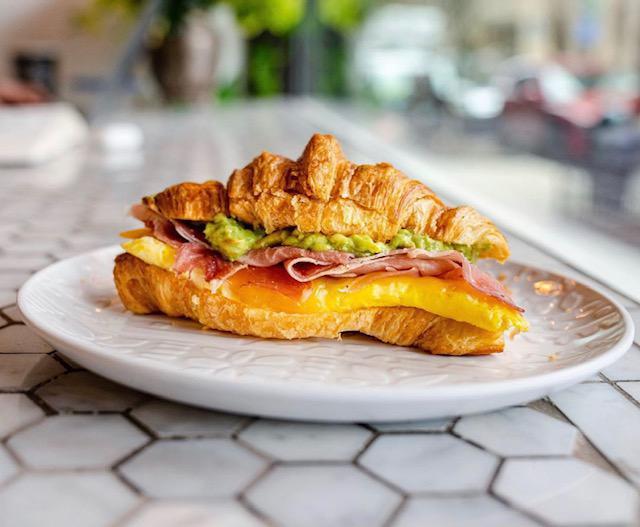Egg and Cheese Croissant · 2 eggs and cheddar cheese ( add-ons are optional )