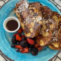 Challah French Toast · Side fruits and maple syrup.