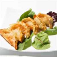 Gyoza  · 6 pieces. Steamed or fried. 