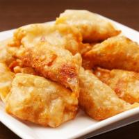 Fried Chicken Dumplings (7pcs) 炸饺子 · Filled dough. 