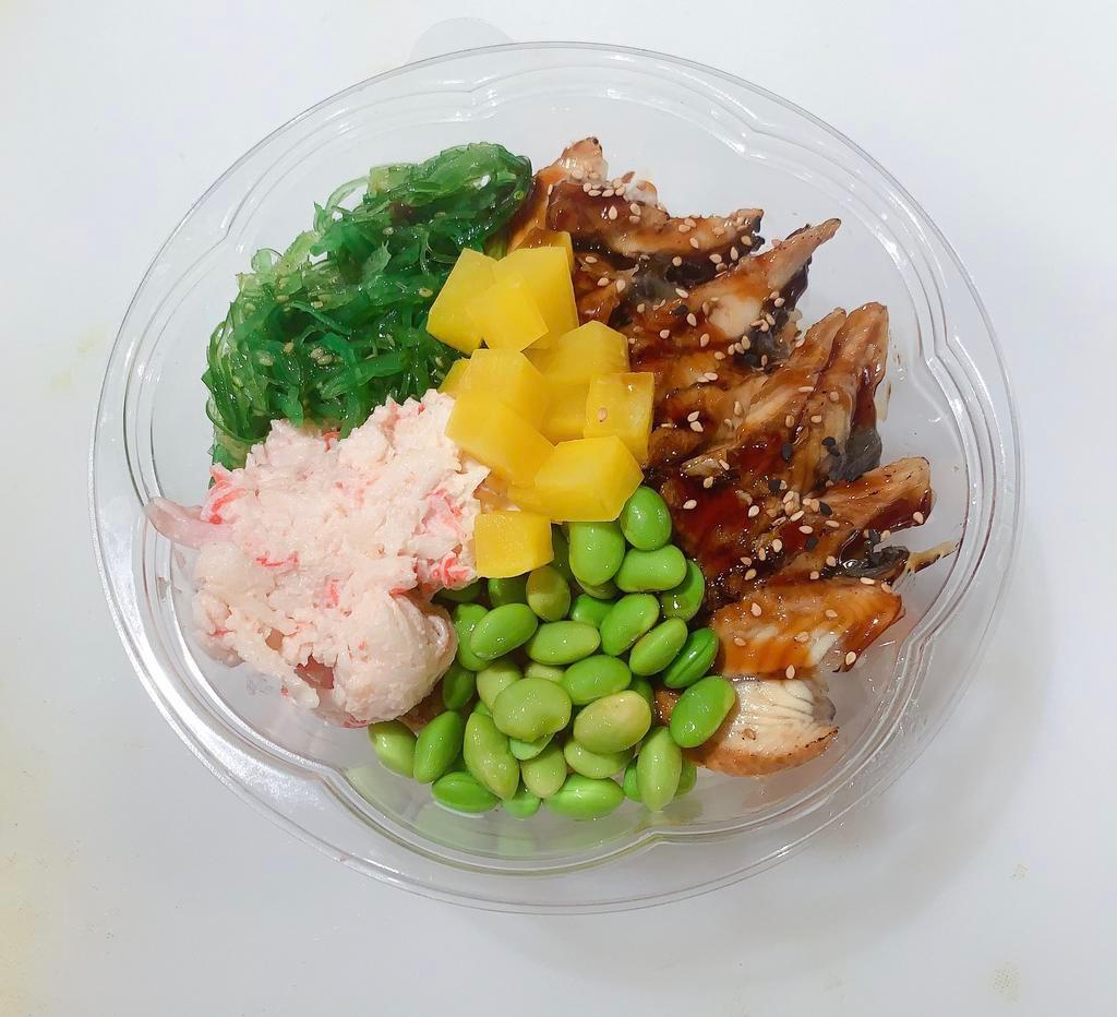Unagi Bowl · Unagi, crab salad, edamame, seaweed salad, green onion and pickled with rice or salad  on the bottom. 