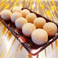  Sesame Ball · 10 pieces sesame with sweet red bean inside. Like dessert selection. 
