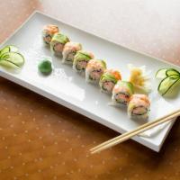  Ichi Roll · Crab salad, cucumber inside, avocado and shrimp on the top.