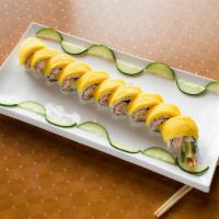 Avatar Roll · Shrimp tempura, cucumber, crab salad and avocado inside. Mango on top.