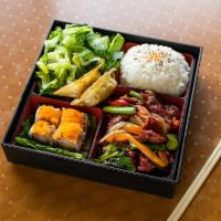  Hibachi Chicken Bento Box Combo · Come with white rice, choice of soup, salad, Goyaza, 4 pieces of CA rolls. 