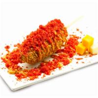 6. Flaming Cheetah Dog · Flaming Cheeto crumbs over spicy mayo sauce.