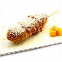 7. Spaghetti Stix Dog · Sprinkle of Parmesan cheese over marinara sauce.