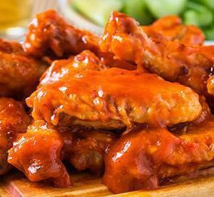 10 wings · 10 wings tossed in your favorite sauce.
Served with your choice of ranch or bleu cheese dipping sauce and a side of celery or carrots