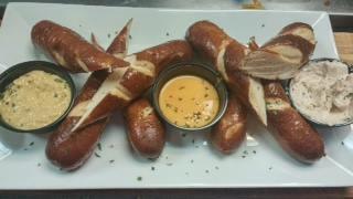 Pretzel Sticks · a trio of pretzel sticks served with our pub cheese, horseradish honey mustard & sweet cream icing