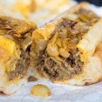 Classic Cheesesteak · shaved rib eye with sautéed onions & your choice of cheese served on a footlong Amoroso Roll