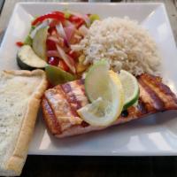 Grilled Salmon Platter · grilled atlantic salmon with lemon dill butter, served with rice, sautéed seasonal vegetable...