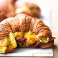 Bacon, Egg & Cheese Croissant · Crispy bacon, melted cheese and cheesy scrambled eggs sandwiched between a toasted buttery c...