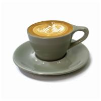 Flat White · A double shot of espresso with silky thin foam.