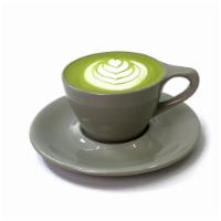 Matcha · Finely ground green tea leaves with silky steamed milk.