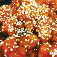 CH01. Sesame Chicken · Diced chicken stir fried in a sweet sauce with toasted sesame seeds garnished with broccoli....