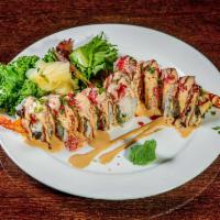 1. China Fortune Roll · Tempura salmon, tempura shrimp with avocado, cream cheese and topped with spicy tuna, green ...