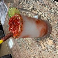 Limonada loca (24oz) · Freshly squeezed lime juice with a chamoy and tajin rim topped with candy spaghetti noodles ...
