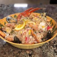 Paella · Crab leg, mussels, shrimp, shell-less shrimp,  imitation crab and octopus 