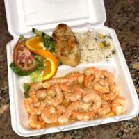 Camarones al Ajo · Garlic shrimp served with salad,white rice, seasoned fries and garlic bread (shrimp is not d...