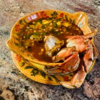 Caldo de Patas de Jalva · Dungeness crab legs soup with mixed vegetables.