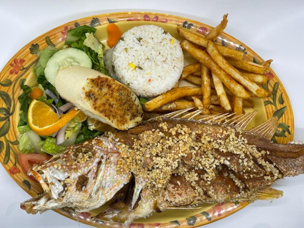 Huachinango al Ajo · 2 lb fried Red snapper with garlic sauce served with white rice, seasoned fries, salad and garlic bread.