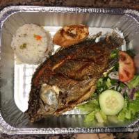 Mojarra Natural · Fried whole tilapia served with white rice,seasoned fries, salad and garlic bread.
