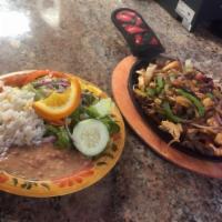 Fajitas Mixtas · Steak, chicken, and shrimp fajitas served with salad, beans , white rice and tortillas. 
