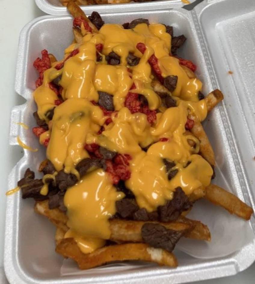 Loaded steak hot Cheetos fries  · Fries topped with grilled steak, hot chips and it’s all beautifully wrapped together with melted cheese.