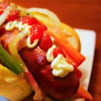 Super Cheesy Bacon Hot Dog · Nacho cheese, onions, bell peppers and bacon.