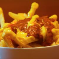 Chili Cheese Fries · French fries with cheese and chili.