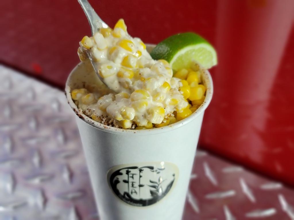 Esquites · Corn with cheese, lime, mayo, and chili pepper.