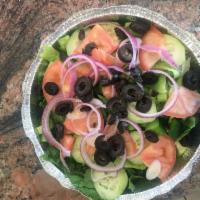 House Salad · Lettuce, tomatoes, cucumber, olives and onions.
