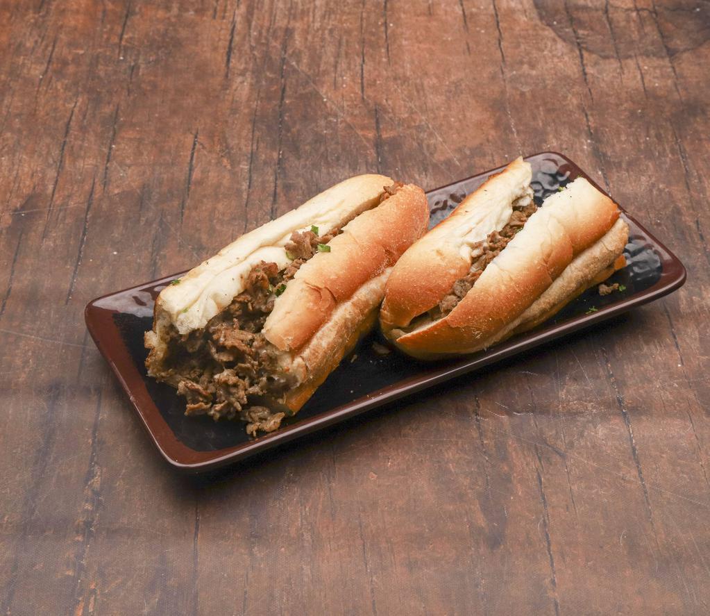 Cheesesteak Sandwich · Steak, cheese, and caramelized onion sandwich. 