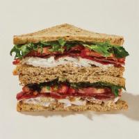 Chicken & Bacon Sandwich · Multi-grain bread filled with grilled chicken, crispy Niman Ranch bacon, sliced tomatoes and...