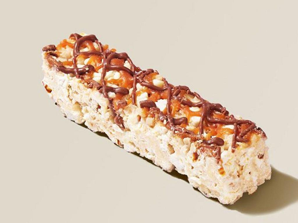 Popcorn Bar · This packaged bar is gluten-free and ridiculously tasty. Popcorn and puffed rice mixed with white chocolate and drizzled with caramel and milk chocolate.