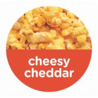Cheesy Cheddar Popcorn · If you love cheese, and you love popcorn, and you want a better-for-you snack, you can't bea...