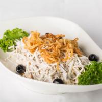 Tashkent Salad · White radish, boiled veal tongue, crispy onion rings seasoned with white sauce.