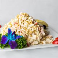 Crab Salad · Cucumber, crab sticks, eggs, green onion, mayonnaise.