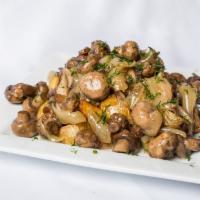 Oven Roasted Potato with Mushrooms · In garlic sauce.